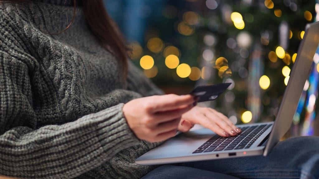 online shopping on laptop during the holidays