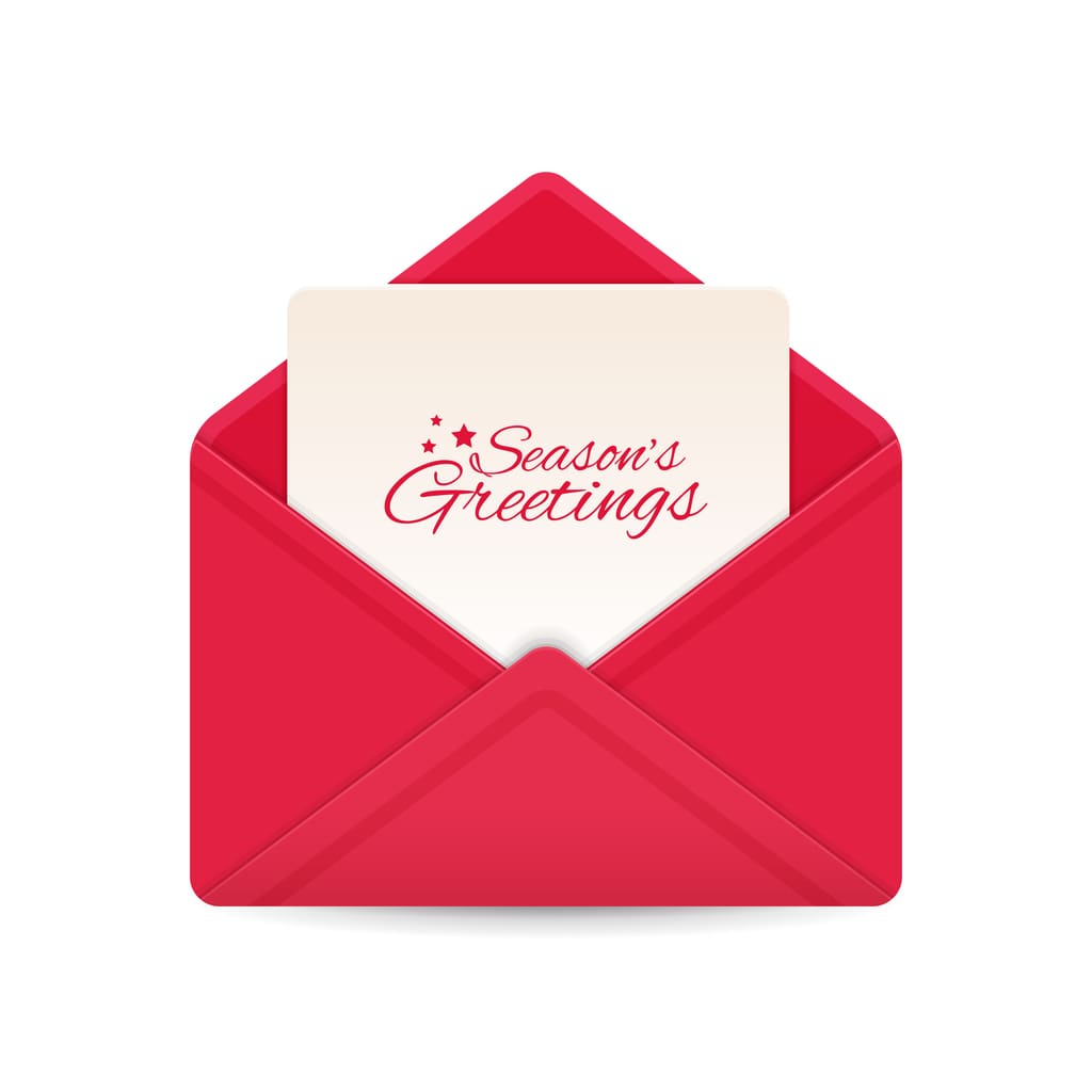 How to Boost Ecommerce Sales During the Holidays. Red envelope with letter inside that says "Season's Greetings"